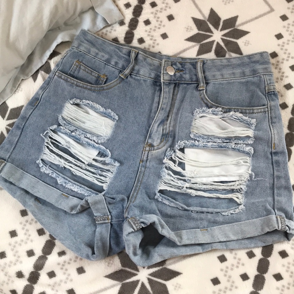 ripped demin shorts